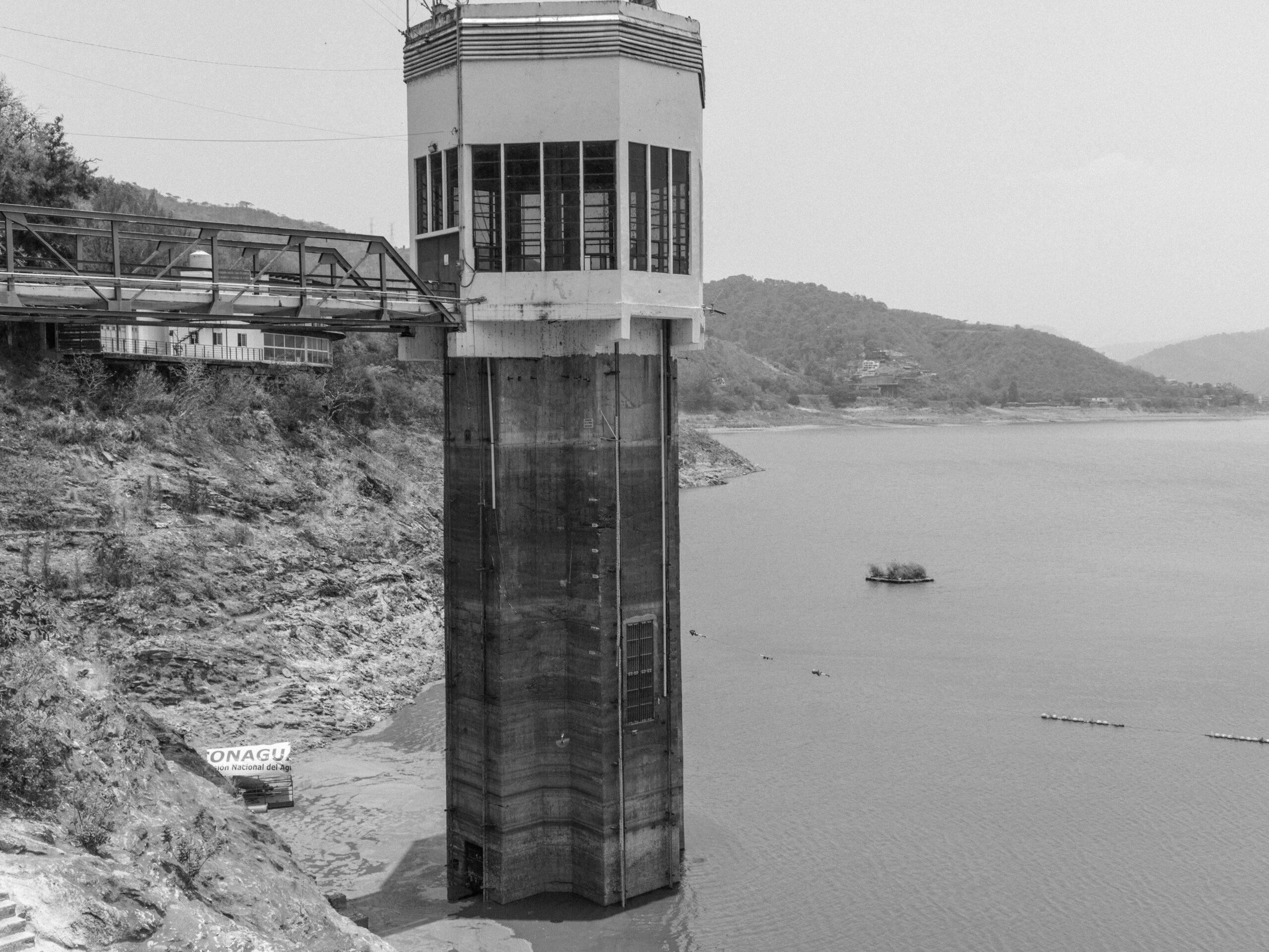 A tower at the reservoir at Valle de Bravo shows water stains, marking where the water had previously been much higher.