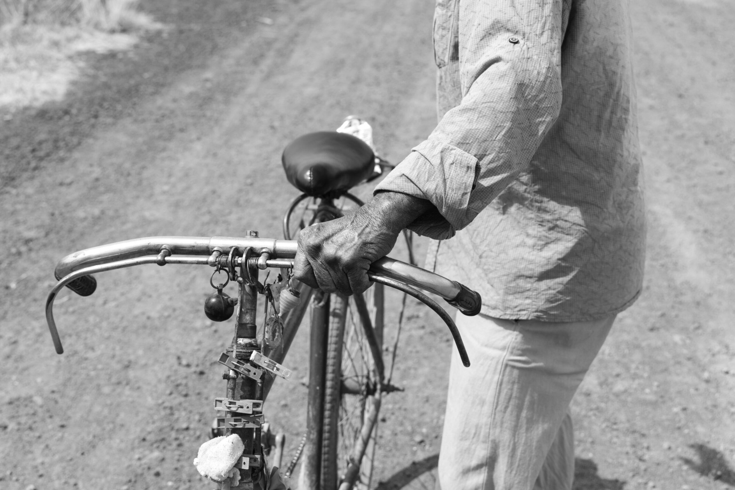 A man walks his bike near the Zumpango Lagoon, May 10, 2024.
